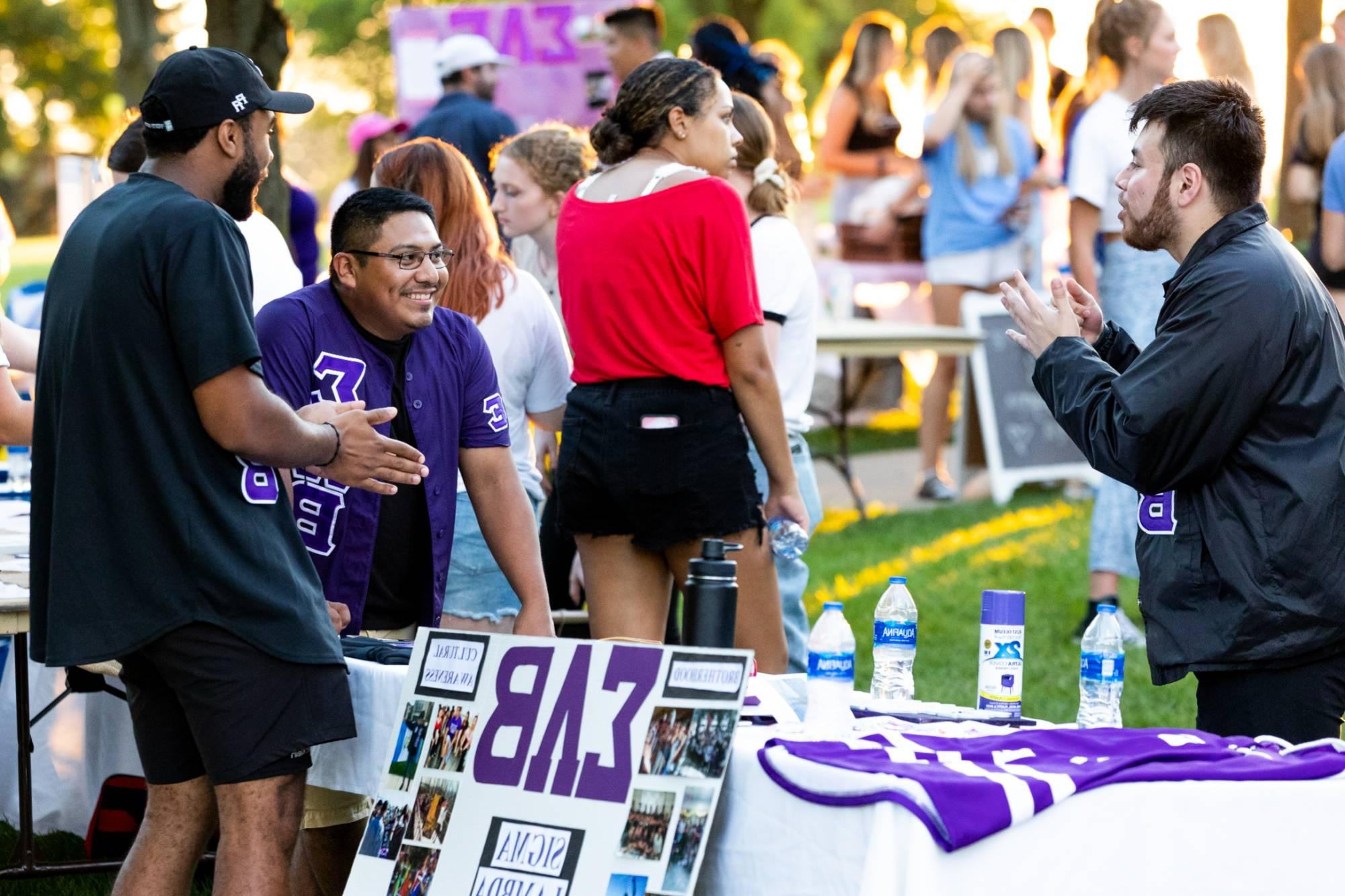 Members of Sigma Lambda Beta Fraternity, Inc. at the Greek Block Party